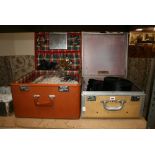 A vintage leather vanity case and another vanity case containing a Herbert Johnson top hat, and