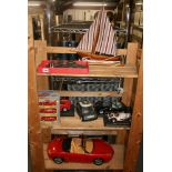 Four Burago model vehicles, a boxed Welly Ferrari Collection set of three, a Barbie sports car, a