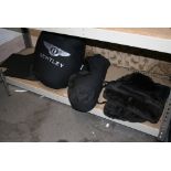 A Bentley car cover with mats [upstairs shelves] FOR DETAILS OF ONLINE BIDDING ON THIS LOT CONTACT