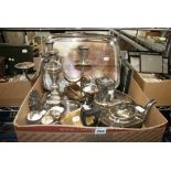 A carton of EPNS and other silver-plated items, including a tea set, oblong tray, candelabrum,