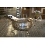 A George II silver sauceboat with flying scroll handle, maker W.S, London 1755, 8.4 ozt FOR