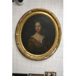 An 18th century English School oval oils on canvas portrait of a woman in a luxurious low-cut