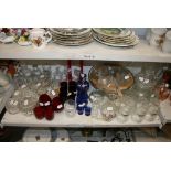 An interesting collection of various drinking vessels, carafes and jugs, including ruby and