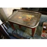 An interesting 19th century toleware metal tea tray painted with a military scene depicting George