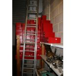 A large quantity of Baccarat red 'leather'-cloth covered empty boxes and a roll of fabric [Garage,