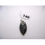 An 18 ct white gold, diamond and onyx pendant, gross weight 12.6 gm. FOR DETAILS OF ONLINE BIDDING