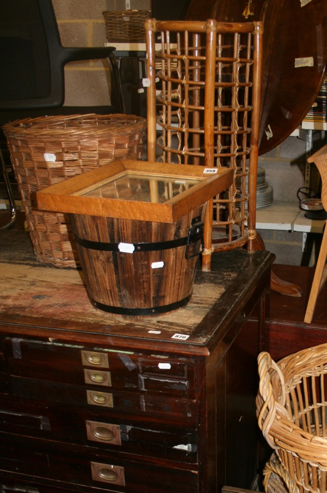 A selection of baskets, a coopered pail, bird's eye maple-framed small mirror, etc. [Garage, on