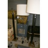 A pair of metal and ebonised standard lamps, and a contemporary adjustable reading lamp [Garage,