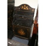 A 19th century waterfall bookcase on three levels with classical decoration to the stained finish,