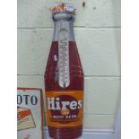 A tinplate bottle shaped advertising sign for 'Hires Root Beer since 1876'. FOR DETAILS OF ONLINE