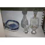 A shelf of antique items comprising: a pair of Old Sheffield Plate decanter stands with crested