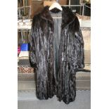 A lady's dark brown mink fur full-length coat with gathered cuffs and hidden fastenings [upstairs