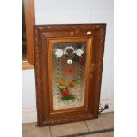 An early 20th century rectangular mirror with painted decoration within a moulded frame. FOR DETAILS