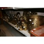 A large and miscellaneous selection of brass and silver-plated items, including rose bowls, music