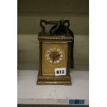 A large French carriage clock, late 19th century, half-hour striking and hour-repeating on a gong,