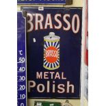 A blue ground enamel advertising sign Brasso Metal Polish with can depicted (16 x 24 in). FOR