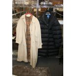 A lady's Burberry rain coat with removable lining and an Escada puffa coat [upstairs rail by