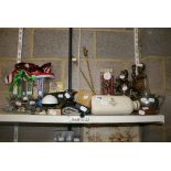 A miscellaneous lot, including African carved wooden figures, a Doulton foot warmer, wine waiter's