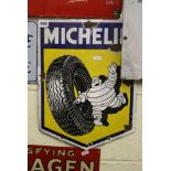 An enamel Michelin Shield advertising sign with tyre and Michelin Man (12 x 16 in). FOR DETAILS OF