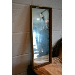 A stylish 1960s rectangular small mirror in a rosewood and gilt frame by Rowley Mirrors, The