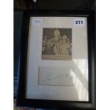 The signature of Tom Mix, movie cowboy, circa 1938, and a newspaper photograph of him with his