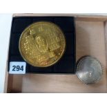 A proof 1989 Presidents' Medal in 999 silver-gilt, 12 ozt, with certificate numbered 201, in