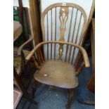 A 19th century Windsor armchair with pierced slat and stick backs, on turned legs FOR DETAILS OF
