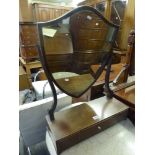 A large 19th century mahogany dressing table mirror the shield-shaped plate above an inlaid base