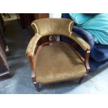 A Victorian armchair of hoop design with pierced slat back on turned legs, with gold velvet