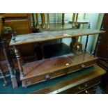 A Victorian mahogany wall shelf above a drawer on turned supports, a walnut circular coffee table, a