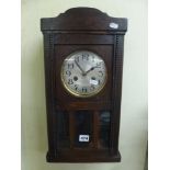 An oak drop dial wall clock [next to s77] FOR DETAILS OF ONLINE BIDDING ON THIS LOT CONTACT