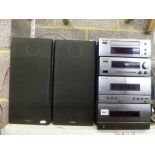 A Hitachi Stacking Music System including compact disk player, a stereo pre-amplifier tuner, a