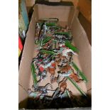 A small carton of vintage lead soldiers, all mounted, some in German uniforms [shelves top of