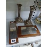A silver plaque on mahogany base, being the Lloyd's Register of Shipping Yacht Trophy for 1975,
