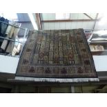 A modern Eastern wool carpet woven with a garden design [railings] FOR DETAILS OF ONLINE BIDDING