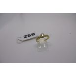 An 18 ct gold and diamond ring, estimated weight 2.6 gm FOR DETAILS OF ONLINE BIDDING ON THIS LOT