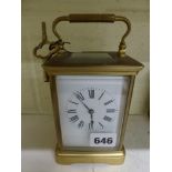 A large French carriage clock, early 20th century, half-hour striking on a gong, brass case, 7 in