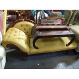 A Victorian chaise longue the moulded mahogany frame with a scroll end and buttoned gold velvet