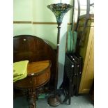 A floor standing Tiffany style standard lamp with glass shade FOR DETAILS OF ONLINE BIDDING ON