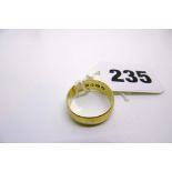 An 18 ct gold wedding ring, estimated weight 5.1 gm FOR DETAILS OF ONLINE BIDDING ON THIS LOT