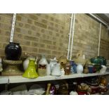 Two shelves of jugs and vases including stoneware and Portmeirion white glazed jug, Prince Pal