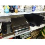 A Sony HP-211A Record Deck and a small Logik television. [G22] FOR DETAILS OF ONLINE BIDDING ON THIS