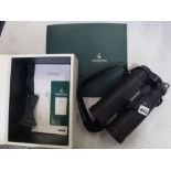 A Swarovski black binoculars SLC15x56 WB, D694645443, with strap, stand and booklet in original