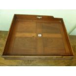 A mahogany butler's tray of panelled form on a Victorian folding stand. FOR DETAILS OF ONLINE