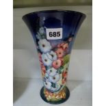 A modern Moorcroft limited edition 'England' vase, decorated with hollyhocks and other flowers,