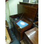 A mahogany stereophonic Georgian-style radiogram cabinet with high fidelity equipment including a