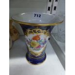 A Meissen porcelain vase painted with a panel of flowers on a blue ground, 5.6 in high [W] FOR