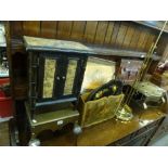 Two 19th century brass fireside footmen, one with pierced heart decoration, a pretty table-top two
