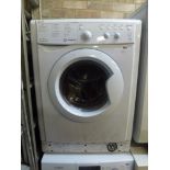 An Indesit Washing Machine IWDC6125. FOR DETAILS OF ONLINE BIDDING ON THIS LOT CONTACT BAINBRIDGES