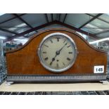 An elegant 1920s mantel timepiece in mahogany with EPNS mounts and ebony stringing, the silvered